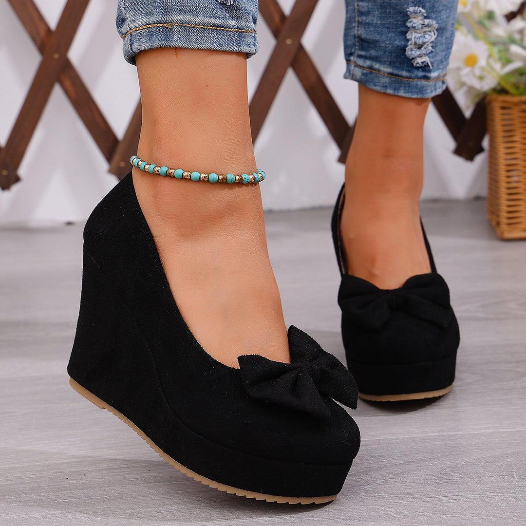 Suede Bow Wedge Pumps