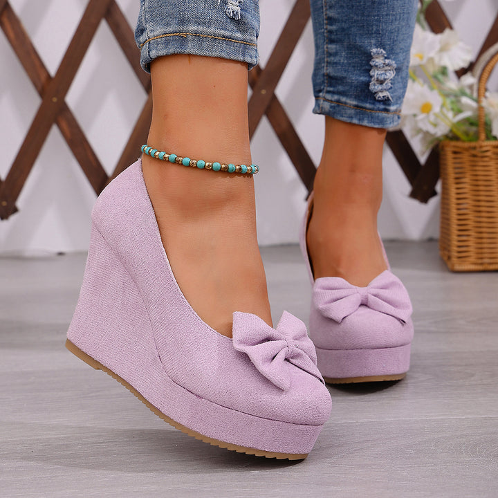 Suede Bow Wedge Pumps