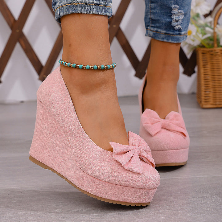 Suede Bow Wedge Pumps
